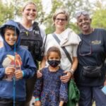 Chicago Police and Firefighters Help Local Youths Catch Their First Fish